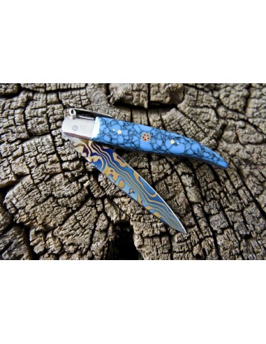 Handcrafted folding knife by Manolo Fernandez, Damascus steel